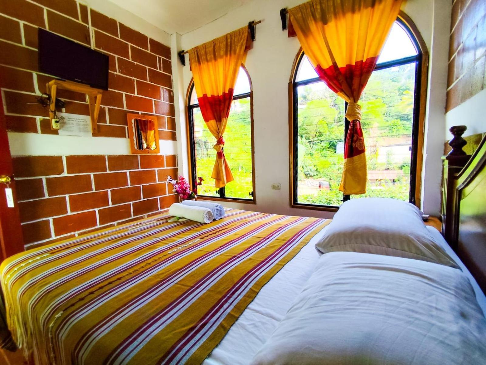 Vinas Hotel Lanquín Rom bilde